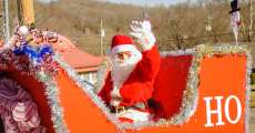 Santa waving in a Christmas parade