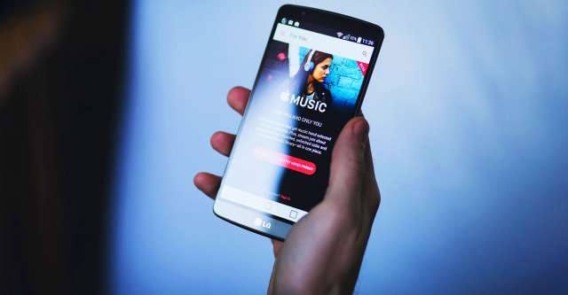 Phone displaying Apple music.