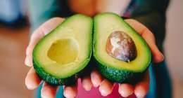Ripe avocado cut in half.