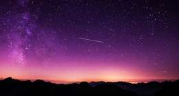 Stars in a purple sky.