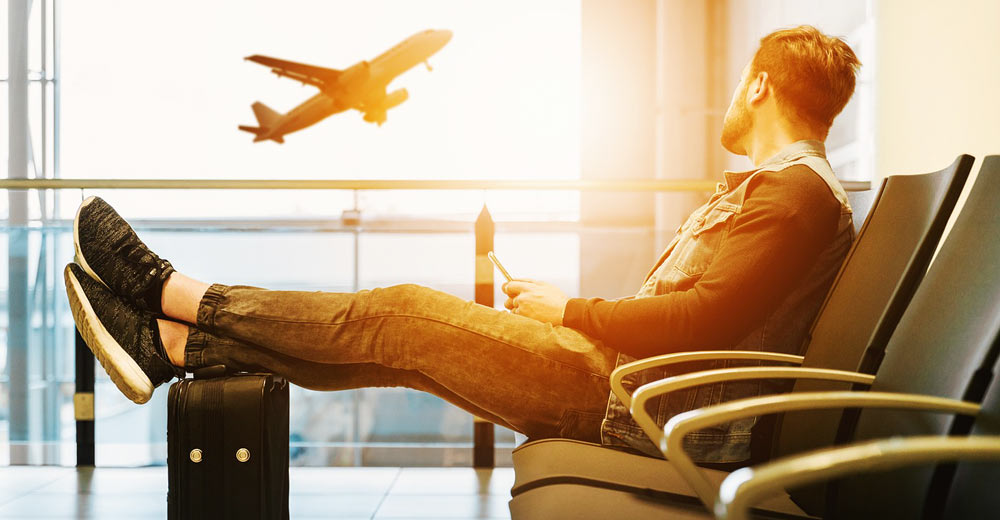 Man waiting at an airport.