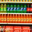 Aisle filled with soda.