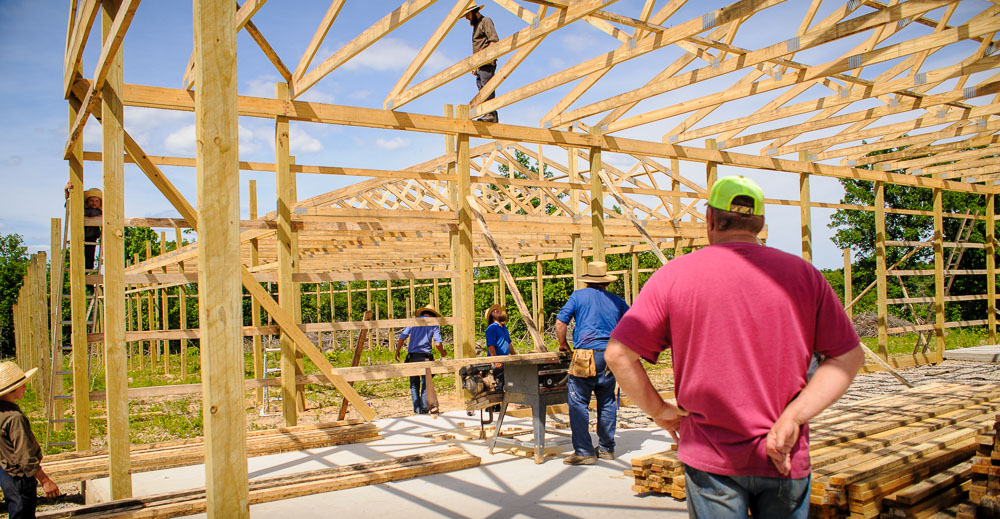 Mr. Sisco overlooks the construction.