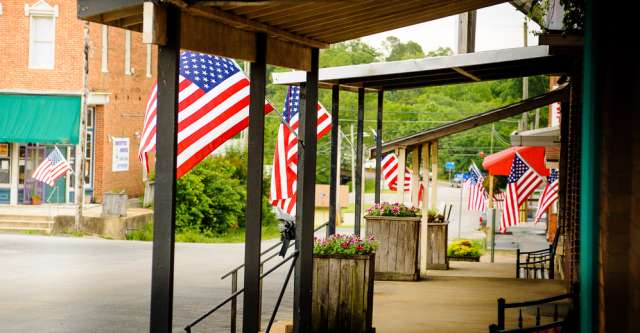 Flags hanging on Alton square.