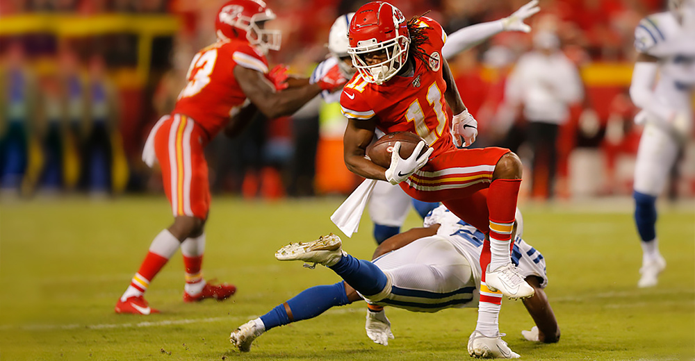 KANSAS CITY, MO - OCTOBER 06: Kansas City Chiefs Wide Receiver Demarcus Robinson (11) spins after the catch to avoid the tackle during the game between the Indianapolis Colts and the Kansas City Chiefs on October 6, 2019 at Arrowhead Stadium in Kansas City, MO. (Photo by Jeffrey Brown/Icon Sportswire)