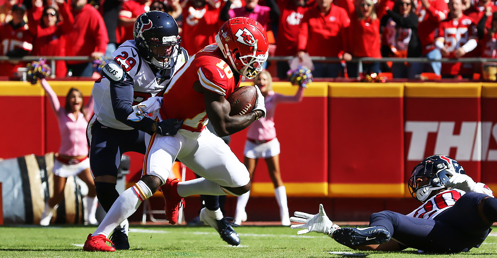KANSAS CITY, MO - OCTOBER 13: Kansas City Chiefs wide receiver Tyreek Hill (10) comes down with a 46-yard reception in the first quarter of an NFL matchup between the Houston Texans and Kansas City Chiefs on October 13, 2019 at Arrowhead Stadium in Kansas City, MO. (Photo by Scott Winters/Icon Sportswire)