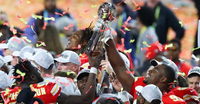 MIAMI GARDENS, FL - FEBRUARY 02: Kansas City Chiefs Defensive Tackle Chris Jones (95) holds up the Vince Lombardi Trophy on the podium after Super Bowl LIV on February 2, 2020 at Hard Rock Stadium in Miami Gardens, FL. (Photo by Rich Graessle/PPI/Icon Sportswire)