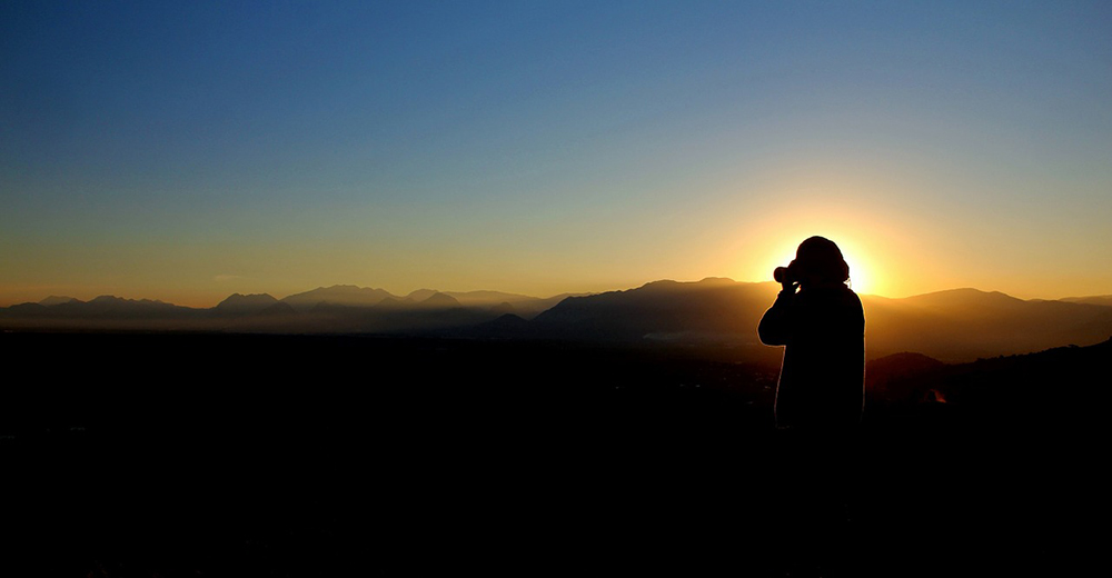 Photographer at sunset.