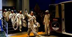 The Apollo 11 crew leaves Kennedy Space Center's Manned Spacecraft Operations Building during the pre-launch countdown.
