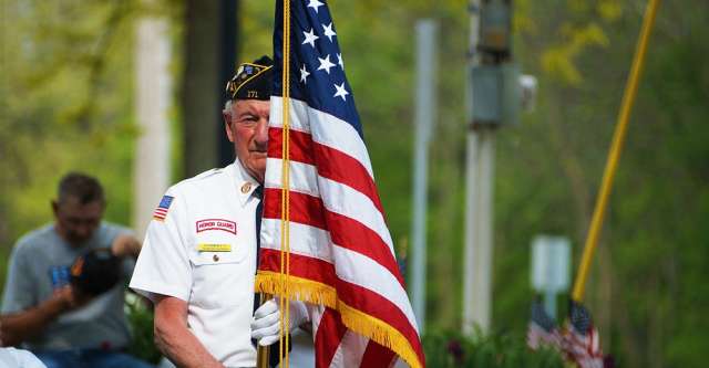 veteran with flag