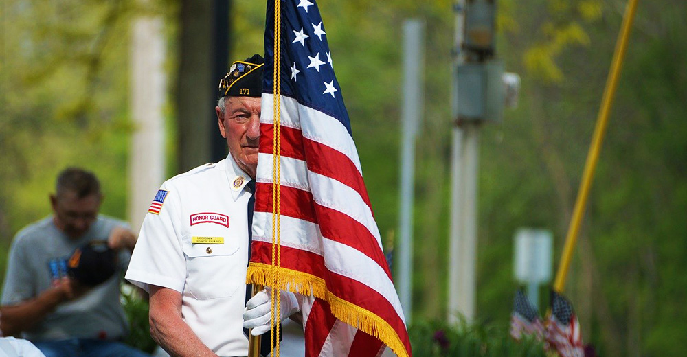 veteran with flag