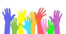 volunteer hands raised