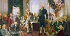 George Washington talking in front of the founding fathers.