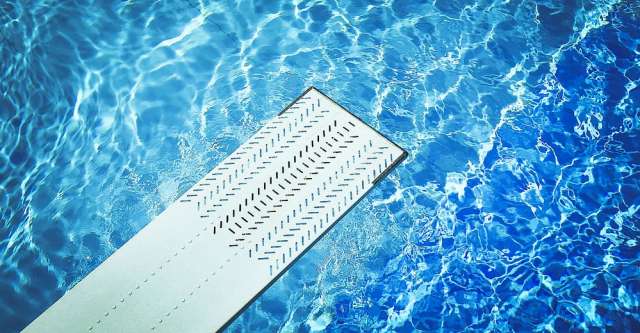 A diving board over pool