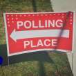 Polling place sign pointing