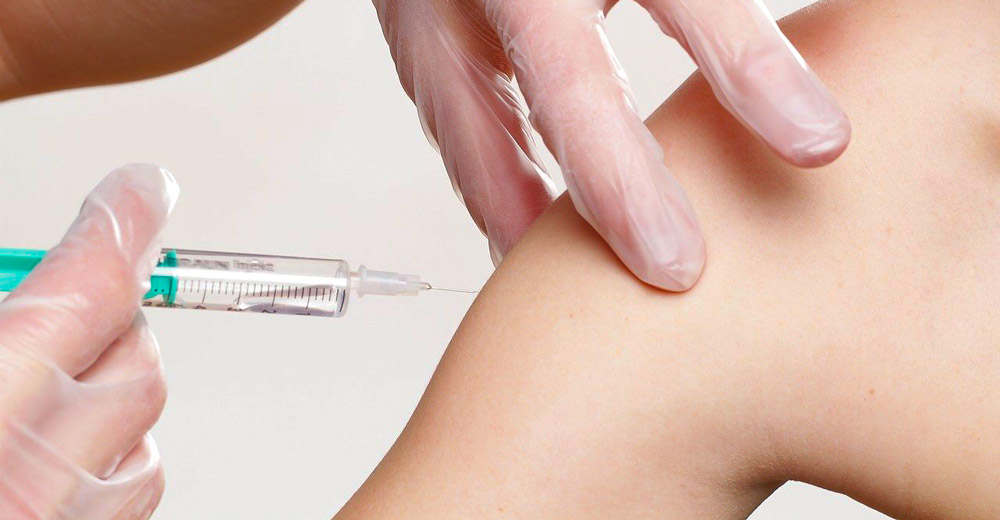 Someone getting a shot.