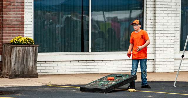 People playing Cornhole at the Ozark "Black Gold" Walnut Festival on October 2, 2021 at Alton, Mo.