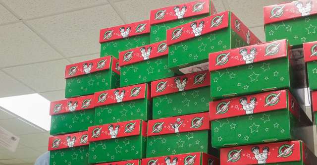 Christmas shoe boxes stacked up.