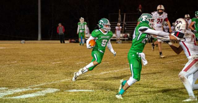 THAYER, MO – NOVEMBER 5: Thayer Bobcats wide receiver Rowan Spencer (9) runs with the ball getting extra yards for his team during the high school football game between the Thayer Bobcats and the Ash Grove Pirates on November 5, 2021, at the Thayer High School football field in Thayer, MO. (Photo by Curtis Thomas/AltonMo.com)