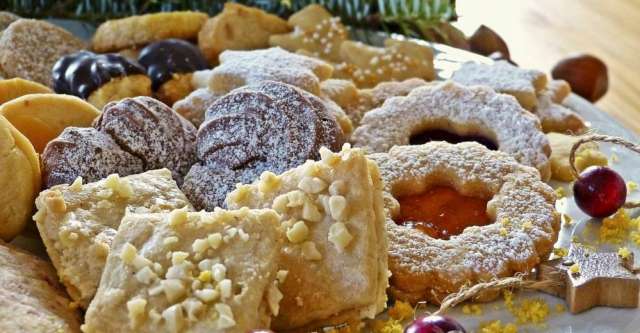 A variety of cookies on a platter.