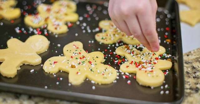 Gingerbread man cookies with sprinkles.