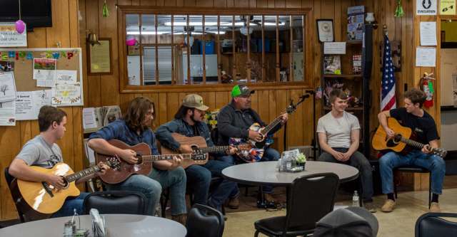 (From left to right): John Taylor, Seth Petty, Rocky Holesapple, Kenny Ziegler, Myles Cockrum, and Tyler Goans played and sang at the Alton Senior Center Open Mic Night.