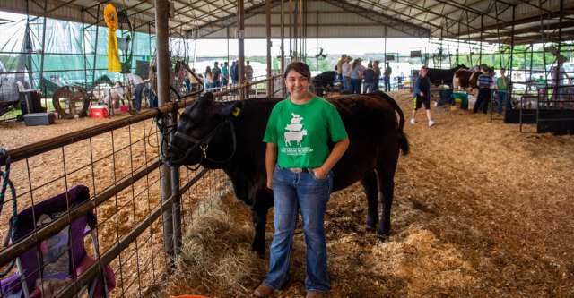 Emily Smith with her steer, Pumba, at the 2022 Heart of the Ozarks Fair.