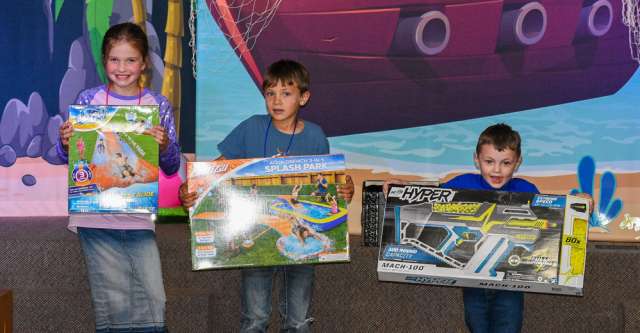 Three kids who got the most points win a slip n' slide, a splash park, and a Nerf gun.