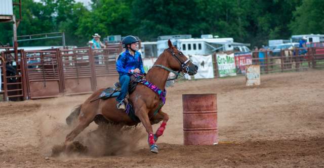 Girl doing Barrel Racing at Thomasville Missouri Rodeo