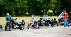 Motorcycles parked at Harps for the Punkin Run.