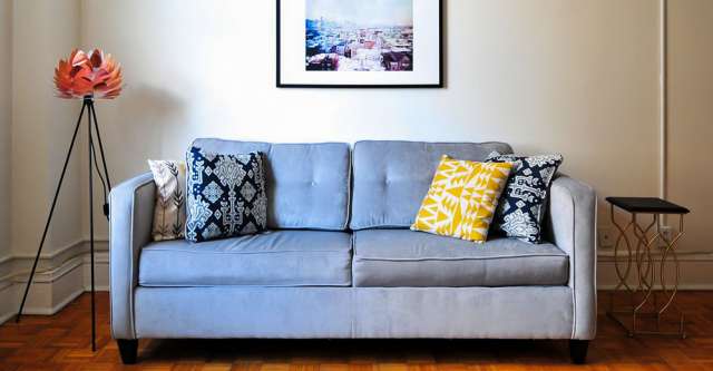 A couch with pillows on it.