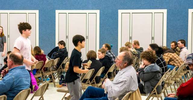 The audience sits expectantly for the movie at the Alton High School Art Club's movie night on February 18, 2023.