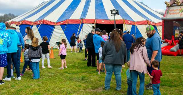 A line waiting to enter the big top before the show begins at the Culpepper & Merriweather Circus on April 3, 2023.