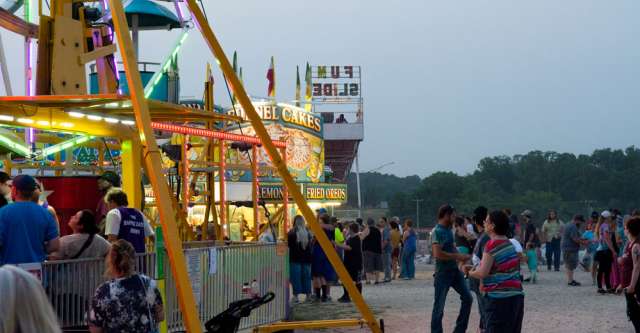 A concession stand along with rides at the Heart of the Ozarks Fair on June 6, 2023.