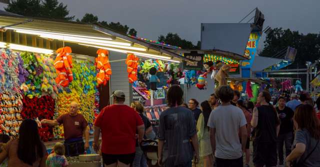 A vendor showing all the prizes you could win at the Heart of the Ozarks Fair on June 6, 2023.