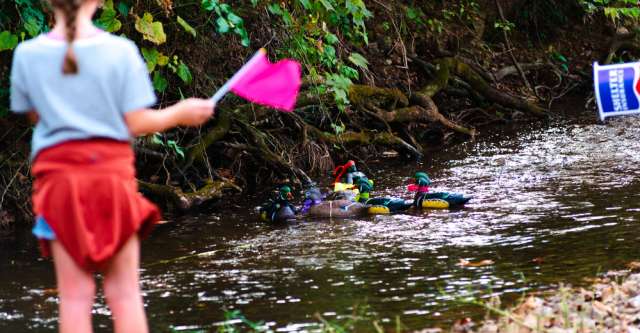 A girl cheering on the her duck at the duck races at Thomasville's Autumn Days on September 23, 2023.