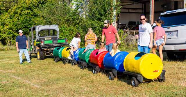 Kids hopping on the train for a free ride at Myrtle's Yester-Daze event on September 30, 2023.