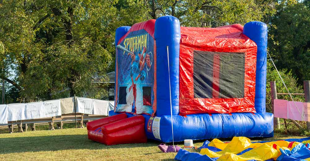Kids bouncy houses getting blown up at the Myrtle Yester-Daze event on September 30, 2023.