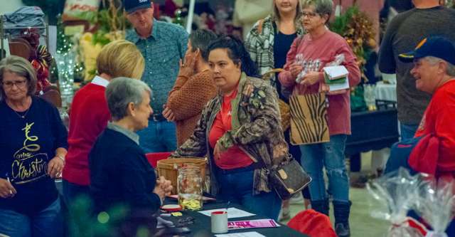 A person checking out their stuff at the Thomasville Christmas Bazaar on November 10, 2023.