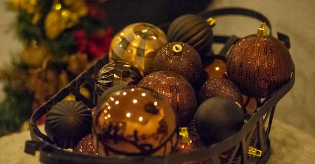 A basket of gold, brown, and dark red ornaments at the Thomasville Christmas Bazaar on November 10, 2023.