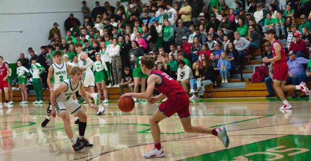 THAYER, MO - DECEMBER 1: Melbourne Bearkatz Kale Caraway (23) tries to fake out a defender during the high school basketball game between the Thayer Bobcats and the Melbourne Bearkatz on December 1, 2023 at the Thayer High School Gym in Thayer, Missouri. (Photo by Amanda Thomas/AltonMo.com)