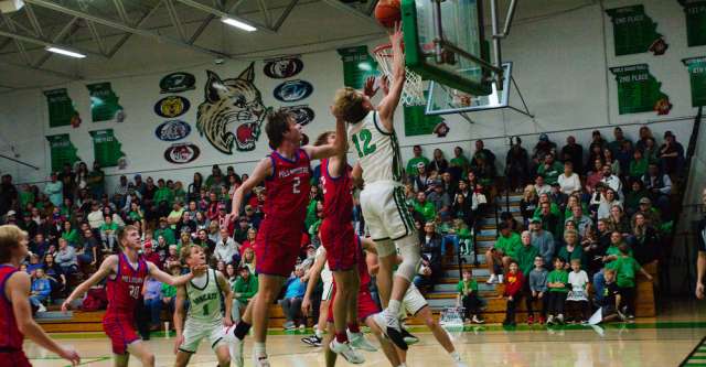 THAYER, MO - DECEMBER 1: Thayer Bobcats Aidan Burns (12) goes for a lay-up during the high school basketball game between the Thayer Bobcats and the Melbourne Bearkatz on December 1, 2023 at the Thayer High School Gym in Thayer, Missouri. (Photo by Amanda Thomas/AltonMo.com)