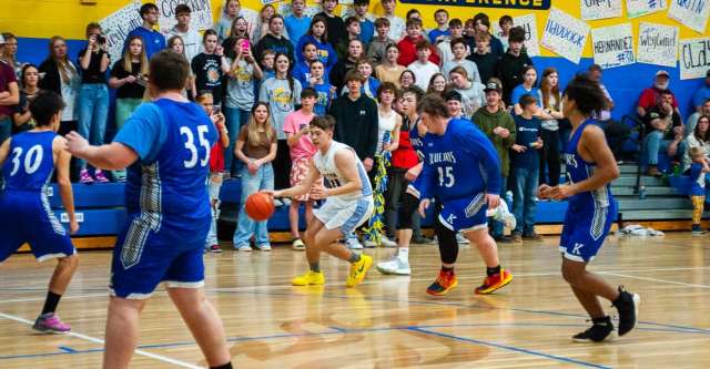 ALTON, MO – JANUARY 30: Alton Comets Kade Clary (11) tries to find an opening during the high school basketball game between the Alton Comets and the Koshkonong Blue Jays on January 30, 2024, at the Alton High School Gym in Alton, Missouri. (Photo by Amanda Thomas/AltonMo.com)