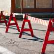 A blockade set up on a street.