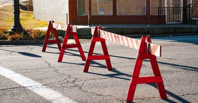 A blockade set up on a street.