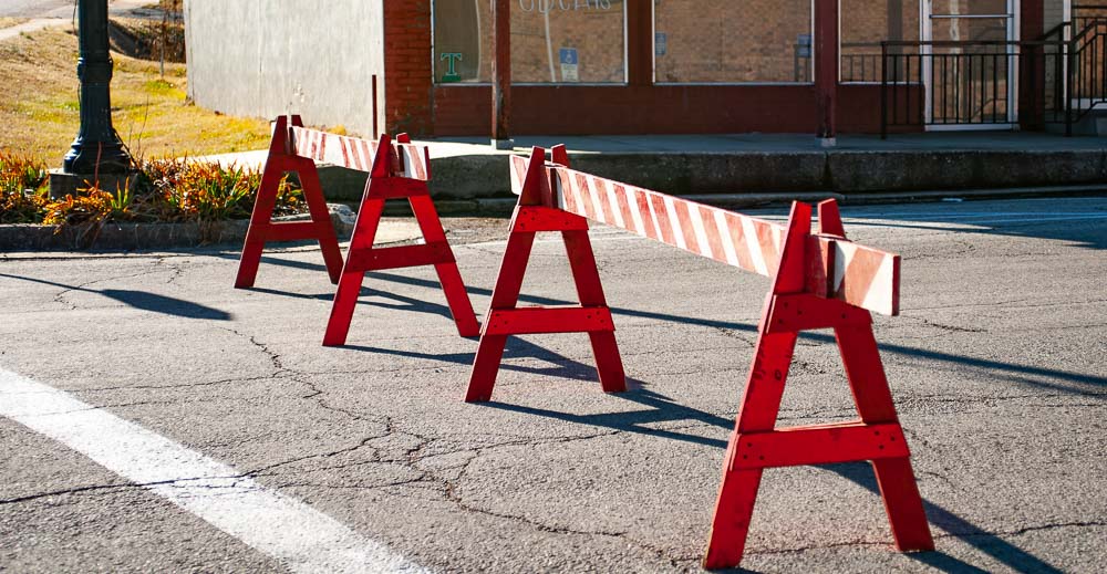 A blockade set up on a street.