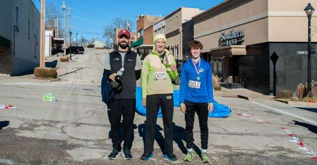 The first, second, and third place overall winners of the 5K race (left to right): Jacob Eckman (second), David Thomas (first), Logan Kennedy (third).