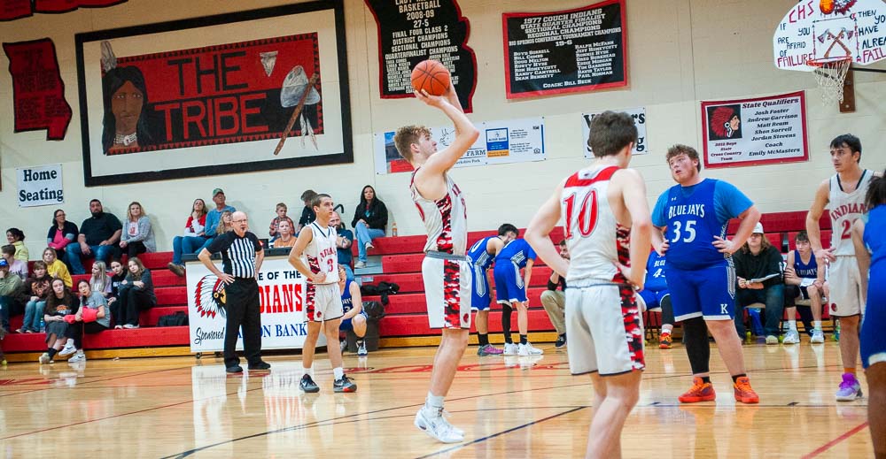 COUCH, MO – FEBRUARY 20: Couch Indian Jobe Sturgeon (25) makes a free throw shot during the high school basketball game between the Couch Indians and the Koshkonong Blue Jays on February 20, 2024, at the Couch High School Gym in Couch, Missouri. (Photo by Amanda Thomas/AltonMo.com)