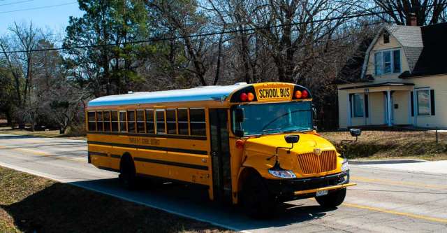 The Thayer Bobcats basketball team heading to the district championship game.