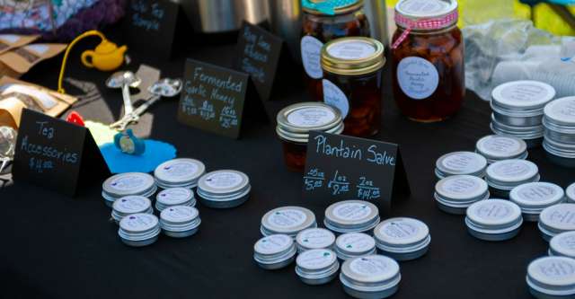 A variety of hand salves being sold at the Thayer Farmer's Market.